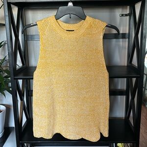 Yellow sleeveless sweater